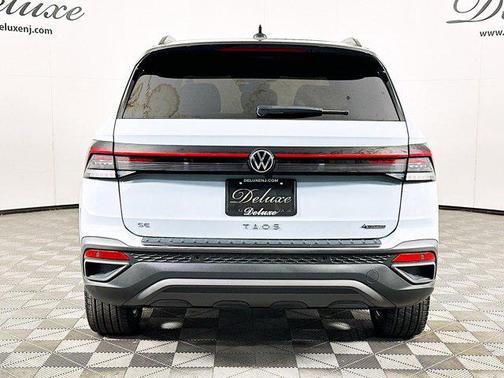 Monument Gray w/Deep Black Roof 2025 Volkswagen Taos SE Black