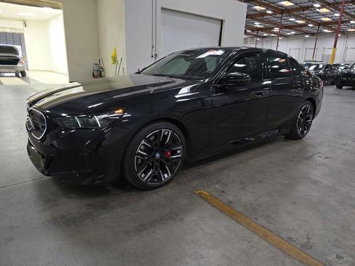 Black Sapphire Metallic 2024 BMW i5 M60