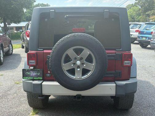 Red 2011 Jeep Wrangler Unlimited Sport