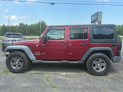 Red 2011 Jeep Wrangler Unlimited Sport