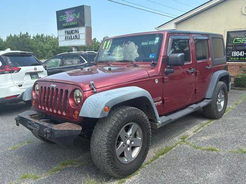 Red 2011 Jeep Wrangler Unlimited Sport