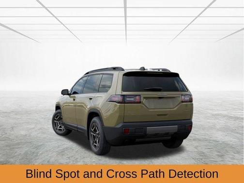 Green 2026 Jeep Cherokee Laredo