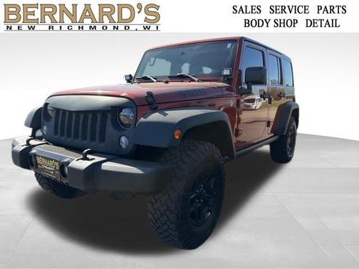 Orange 2014 Jeep Wrangler Unlimited Sport