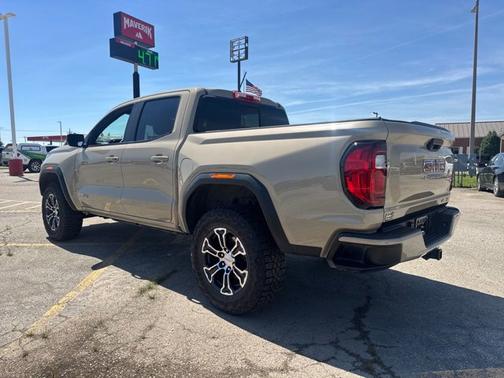 Desert Sand Metallic 2024 GMC Canyon 4WD AT4