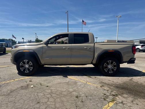 Desert Sand Metallic 2024 GMC Canyon 4WD AT4
