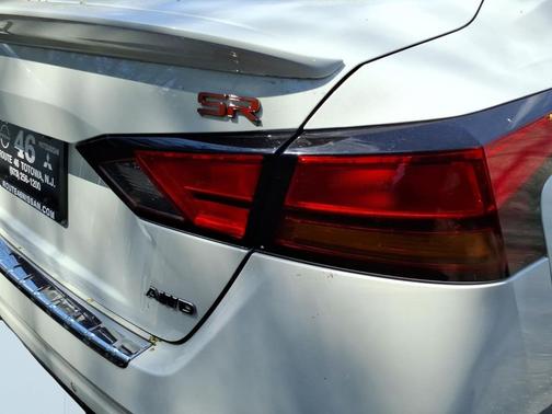 Pearl White Tricoat 2023 Nissan Altima SR Intelligent AWD