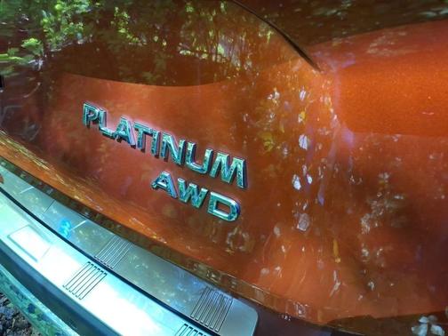 Pearl White Tricoat/Super Black 2023 Nissan Rogue Platinum