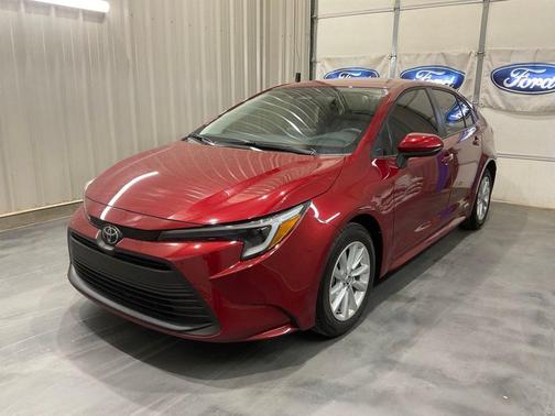 Red 2026 Toyota Corolla Hybrid LE
