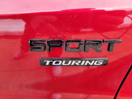 Radiant Red Metallic 2026 Honda CR-V Hybrid Sport Touring AWD