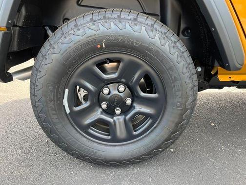 Yellow 2026 Jeep Wrangler Sport