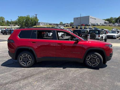 Red 2026 Jeep Cherokee Laredo