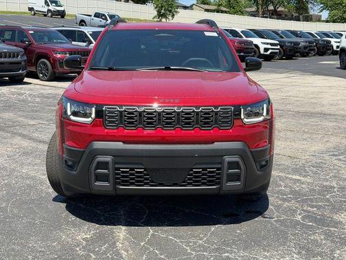 Red 2026 Jeep Cherokee Laredo