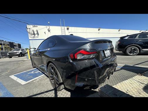 Black Sapphire Metallic 2024 BMW M240 i xDrive