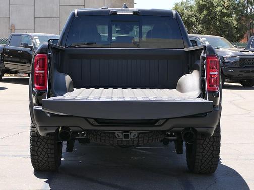 Diamond Black Crystal Pearlcoat 2026 RAM 1500 RHO Crew Cab 4x4 5'7' Box