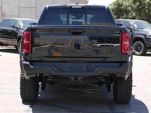 Diamond Black Crystal Pearlcoat 2026 RAM 1500 RHO Crew Cab 4x4 5'7' Box