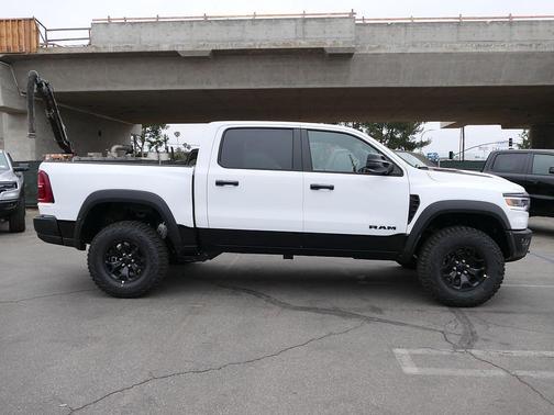 Bright White Clearcoat 2026 RAM 1500 RHO Crew Cab 4x4 5'7' Box