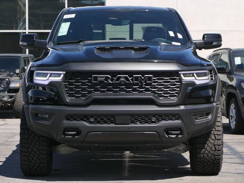 Diamond Black Crystal Pearlcoat 2026 RAM 1500 RHO Crew Cab 4x4 5'7' Box