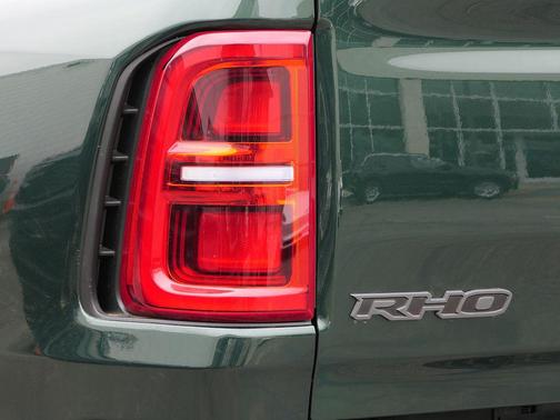 Green Metallic 2026 RAM 1500 RHO Crew Cab 4x4 5'7' Box