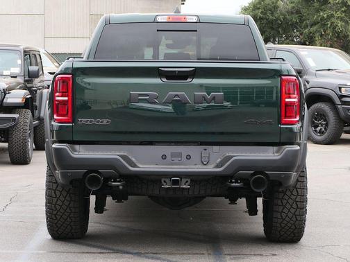 Green Metallic 2026 RAM 1500 RHO Crew Cab 4x4 5'7' Box