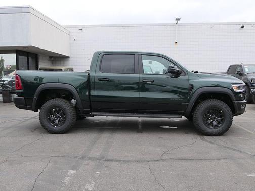 Green Metallic 2026 RAM 1500 RHO Crew Cab 4x4 5'7' Box