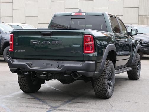 Green Metallic 2026 RAM 1500 RHO Crew Cab 4x4 5'7' Box