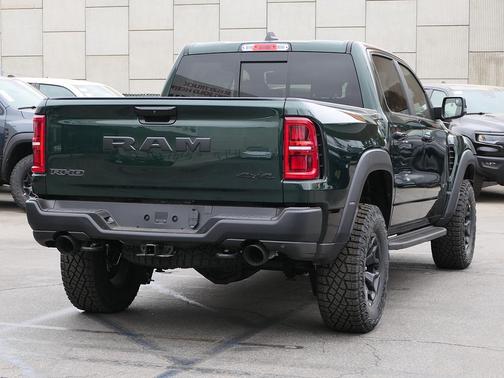 Serrano Green Metallic 2026 RAM 1500 RHO Crew Cab 4x4 5'7' Box
