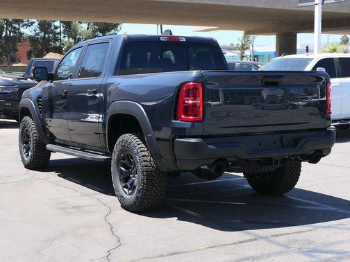 Blue Metallic 2026 RAM 1500 RHO Crew Cab 4x4 5'7' Box