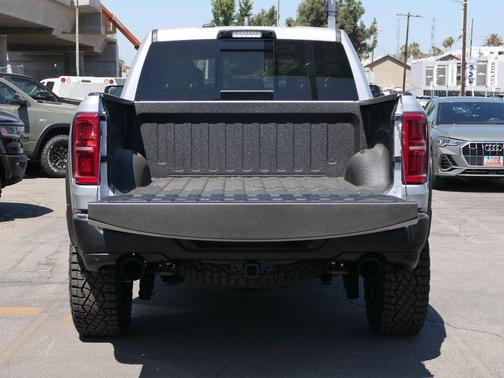 Silver 2026 RAM 1500 RHO Crew Cab 4x4 5'7' Box