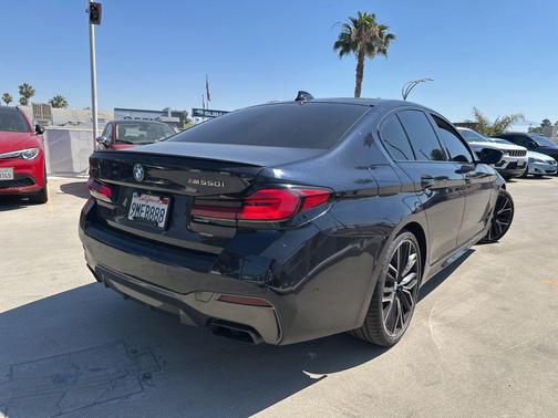 Carbon Black Metallic 2023 BMW M550 i Xdrive