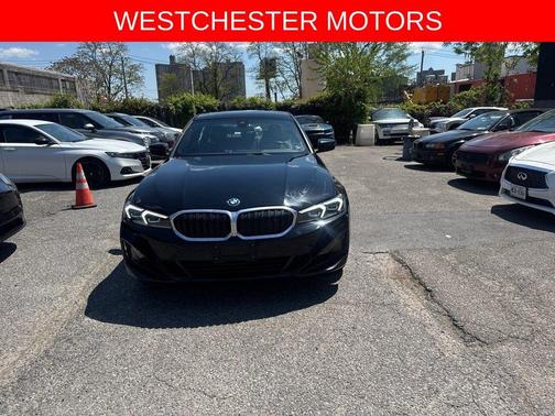 Jet Black 2024 BMW 330e xDrive