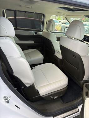 Serenity White 2024 Hyundai SANTA FE HEV Calligraphy