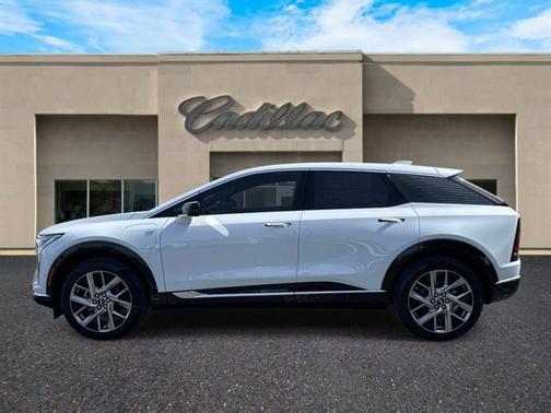 Vibrant White Tricoat 2026 Cadillac OPTIQ Premium Luxury