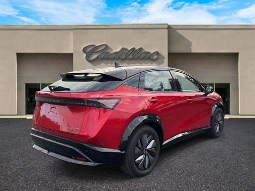 Passion Red Tricoat/Black Diamond Pearl 2024 Nissan ARIYA PLATINUM+