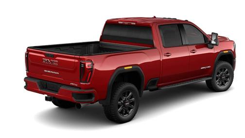 Volcanic Red 2026 GMC Sierra 3500 AT4