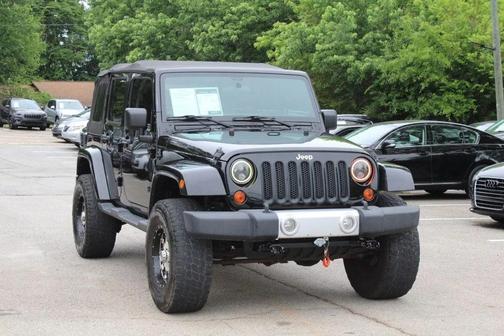 Black Clearcoat 2012 Jeep Wrangler Unlimited Sahara