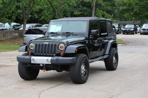 Black Clearcoat 2012 Jeep Wrangler Unlimited Sahara