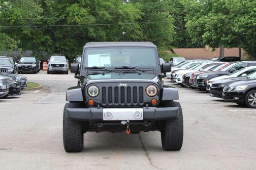 Black Clearcoat 2012 Jeep Wrangler Unlimited Sahara