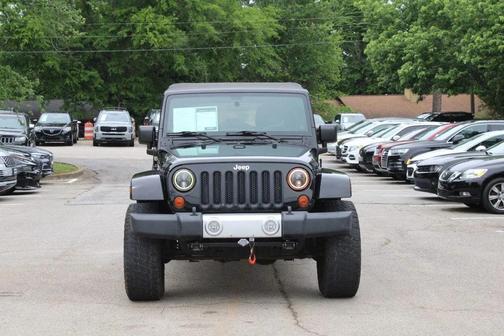 Black Clearcoat 2012 Jeep Wrangler Unlimited Sahara