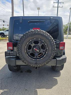 Black Clearcoat 2016 Jeep Wrangler Unlimited Sahara