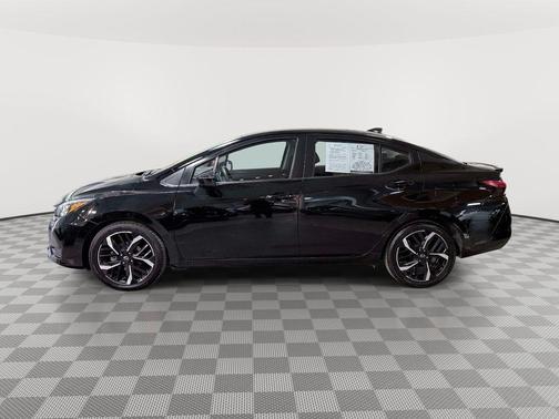 Super Black Metallic 2024 Nissan Versa 1.6 SR