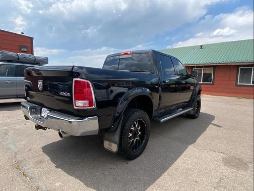 Black 2014 RAM 1500 Laramie