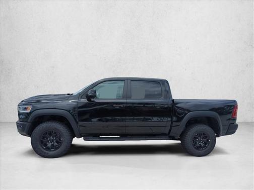 Diamond Black Crystal Pearlcoat 2026 RAM 1500 RHO Crew Cab 4x4 5'7' Box