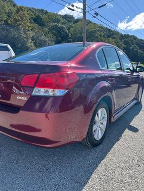 Red 2011 Subaru Legacy Premium