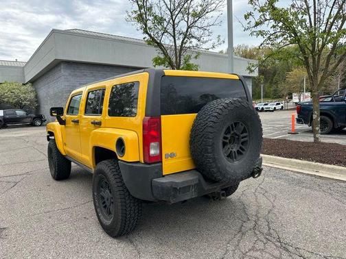 Yellow 2007 Hummer H3 Base