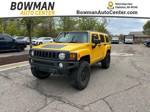 Yellow 2007 Hummer H3 Base