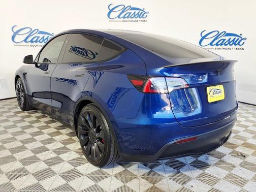 Blue 2025 Tesla Model Y Performance Dual Motor All-Wheel Drive