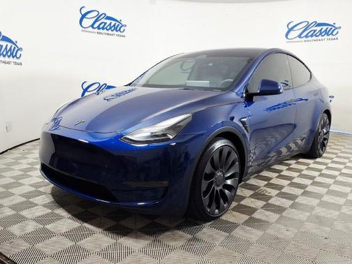 Blue 2025 Tesla Model Y Performance Dual Motor All-Wheel Drive