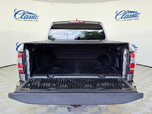 Gray 2023 Nissan Frontier SV