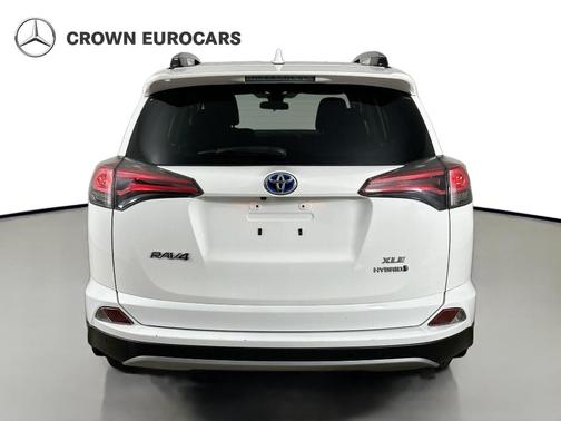 Super White 2018 Toyota RAV4 Hybrid LE Plus