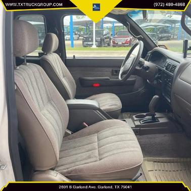 Natural White 1999 Toyota Tacoma Xtracab
